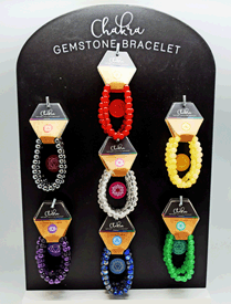 Set of 35 Gemstone Chakra Bracelets on Display Board